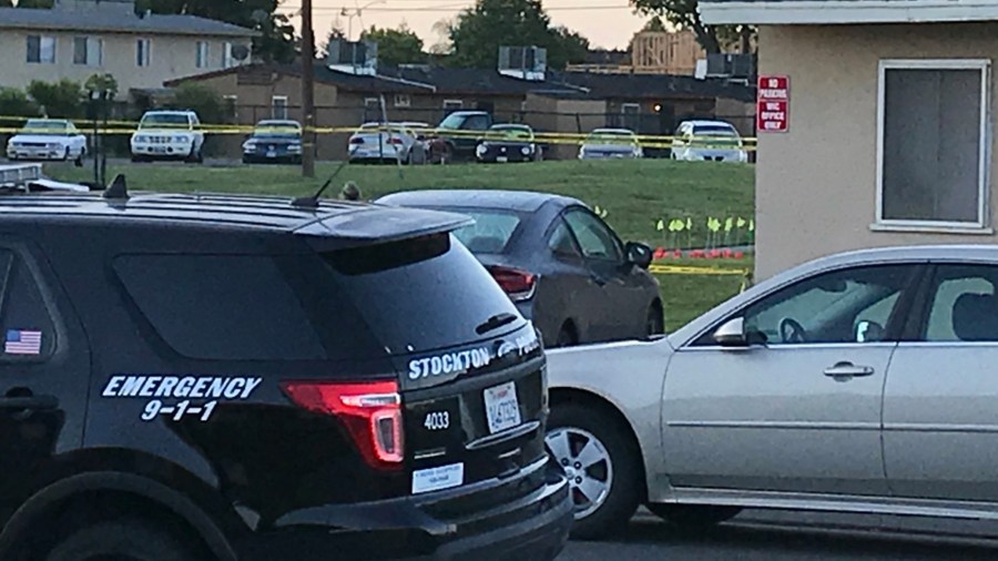 Stockton police remain at the scene of a fatal shooting on May 14, 2018. (Credit: Pedro Rivera, KTXL)