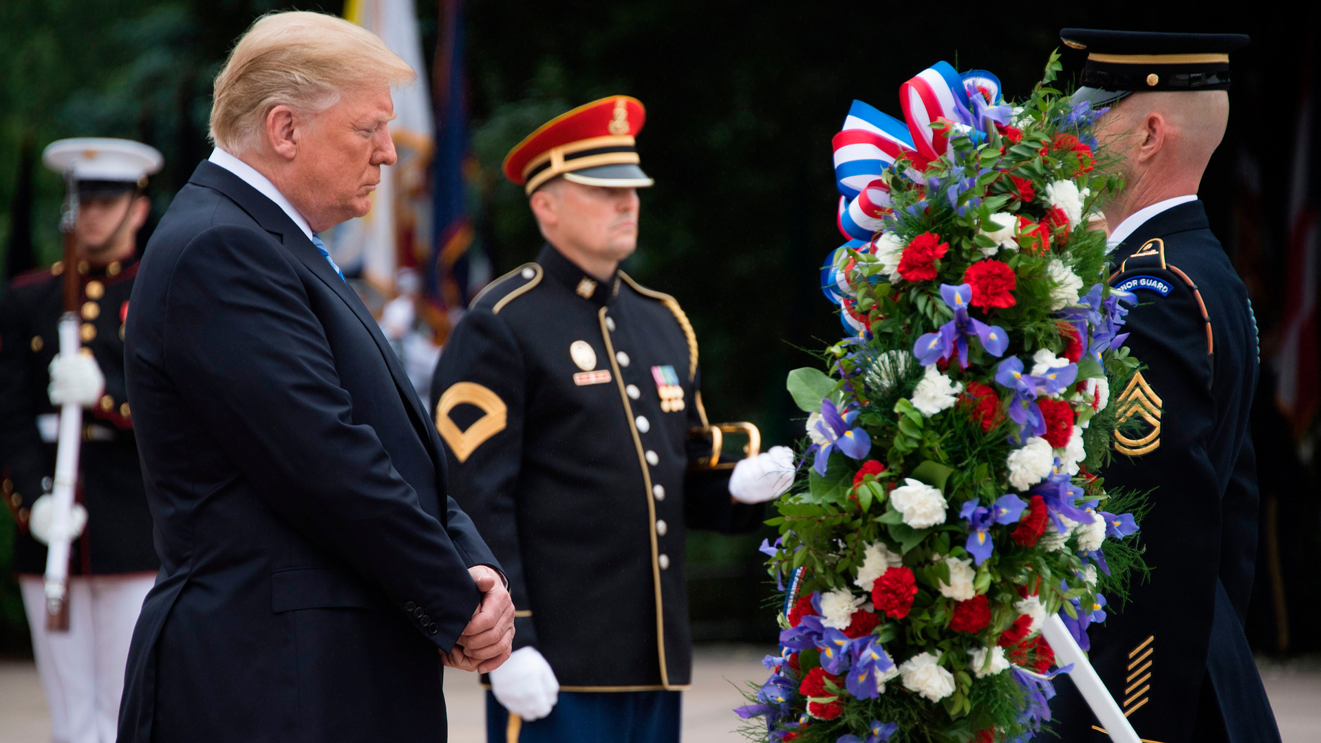 President Donald Trump marks Memorial Day by laying a wreath at the Tomb of the Unknown Soldier at Arlington National Cemetery in Arlington, Virginia, on May 28, 2018 (Credit: Jim Watson/AFP/Getty Images)