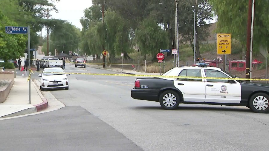 The scene in Woodland Hills where police discovered possible explosives inside a vehicle suspected to be stolen is seen here just hours later on May 20, 2018. (Credit: KTLA)