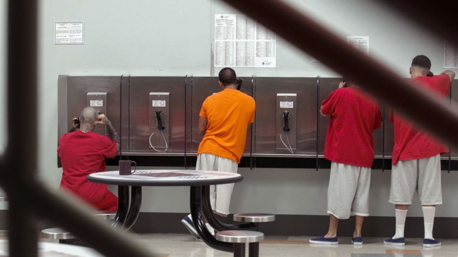 An undated photo shows detainees makeing phone calls at Adelanto Detention Facility. (Credit: Irfan Khan / Los Angeles Times)