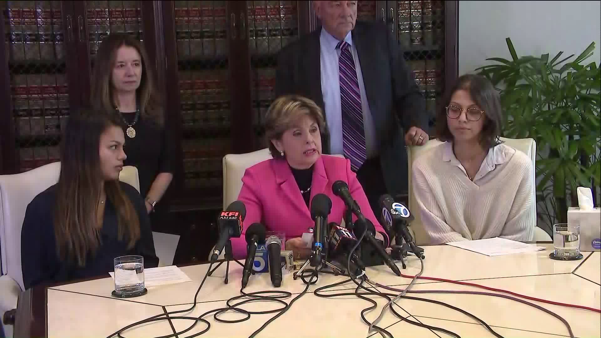 Attorney Gloria Allred announced amendments to an existing lawsuit against USC and George Tyndall during a press conference on June 12, 2018. She was joined by two alleged victims, Daniella Mohazab (left) and Anika Narayanan (right). (Credit: KTLA)