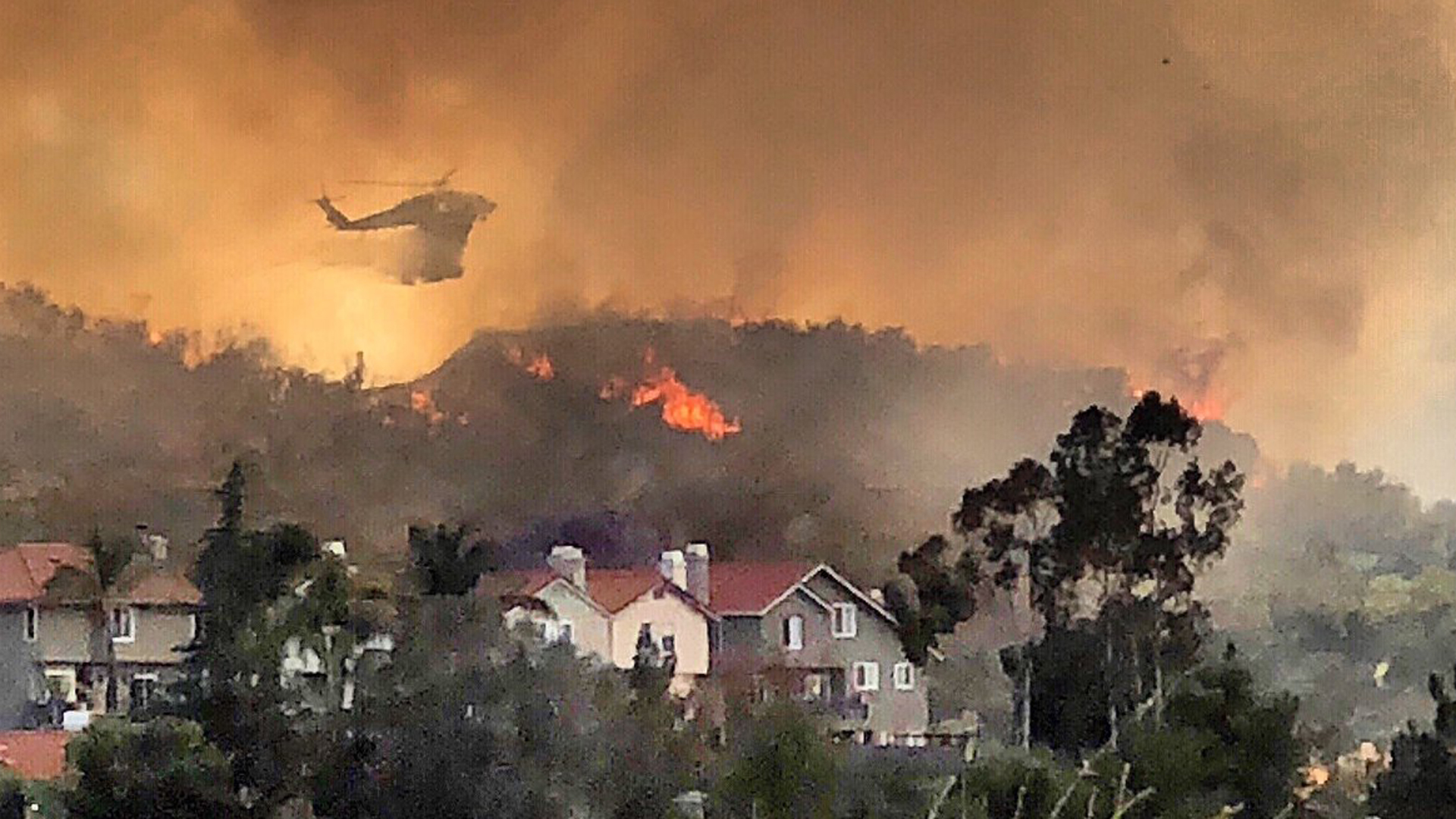 Firehawk helicopters offer air support protecting homes in Santa Clarita as the South Fire raged through the area on June 9, 2018. (Credit: Los Angeles County Fire Department Air Operations via Twitter)