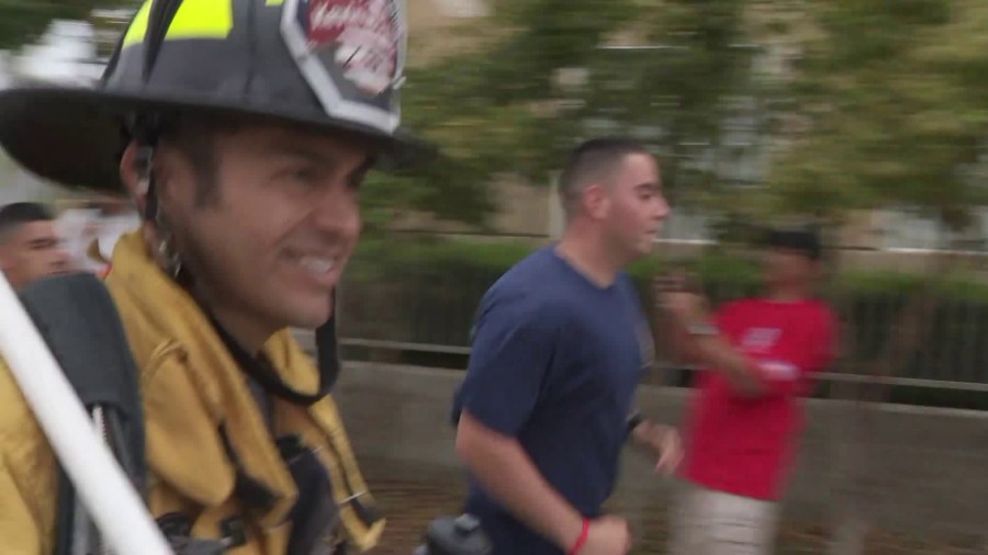 Los Angeles County firefighter Joe Zambrano runs in Bellflower on June 23, 2018. (Credit: KTLA)