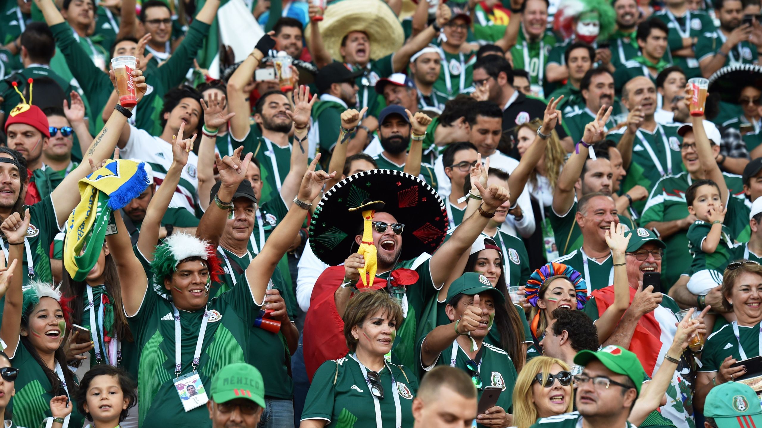 Mexico fans cheer during the World Cup match between Mexico and Sweden at the Ekaterinburg Arena on June 27, 2018. (Credit: Hector Retamal / AFP / Getty Images)