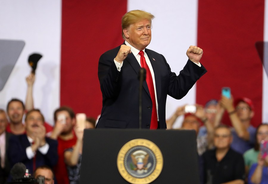 Donald Trump greets supporters during a campaign rally at Scheels Arena on June 27, 2018 in Fargo, North Dakota. (Credit: Justin Sullivan/Getty Images)