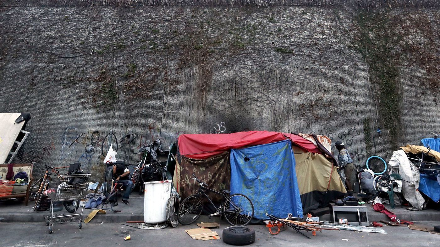 A homeless encampment is seen along Grand Avenue in South Los Angeles in this undated photo. (Credit: Luis Sinco / Los Angeles Times)