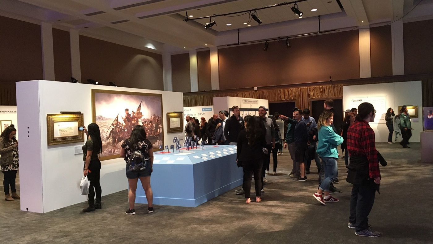 Attendees of Clusterfest in San Francisco attend The Donald J. Trump Presidential Twitter Library, created by Comedy Central's "The Daily Show With Trevor Noah" in this undated photo. (Credit: Chris Barton / Los Angeles Times)