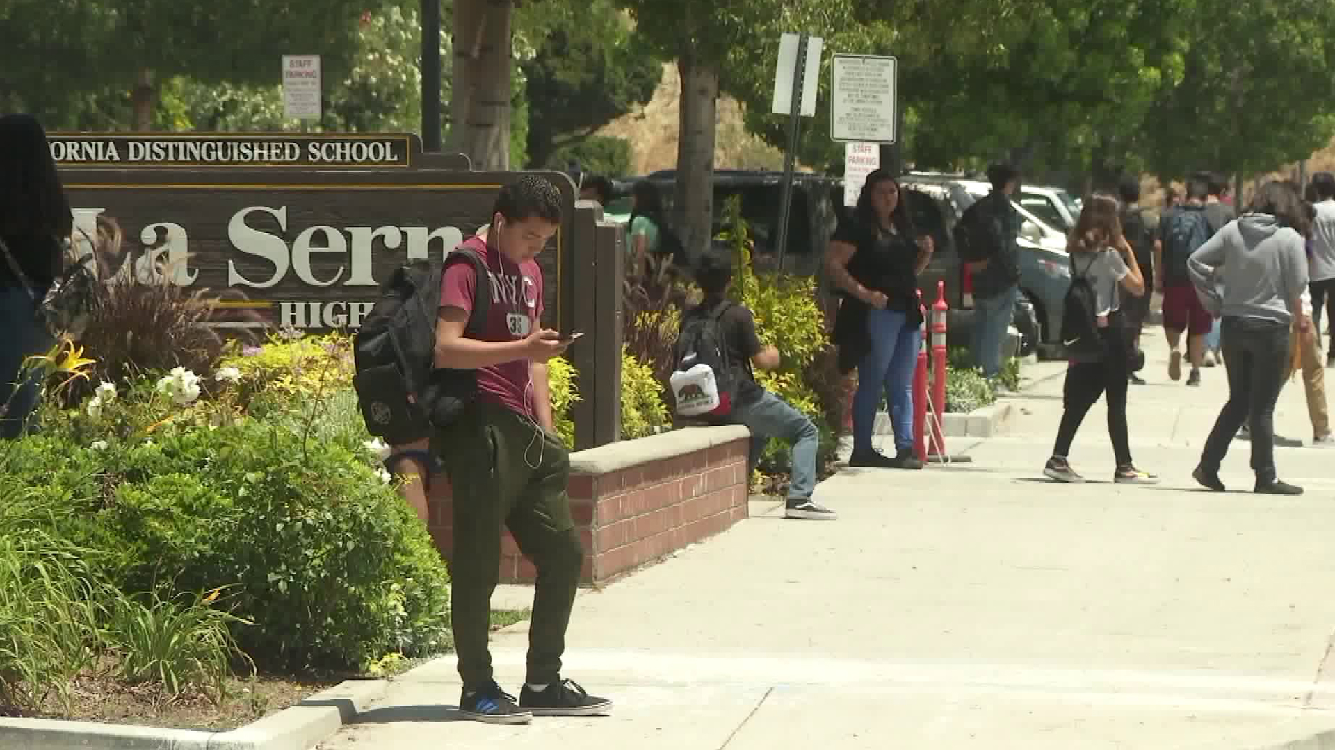 Students stand in front of La Serna High School in Whittier on June 19, 2018. (Credit: KTLA)