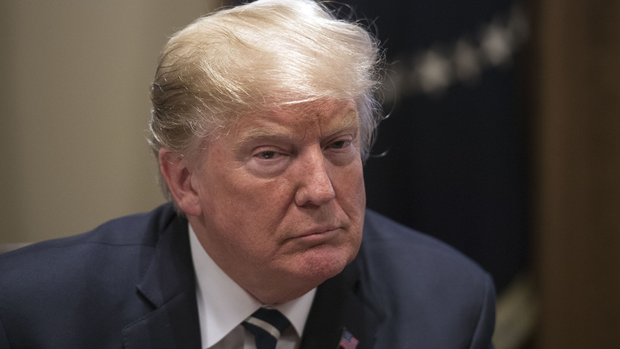 Donald Trump speaks about his meeting with Russian President Vladimir Putin ahead of a meeting with Republican lawmakers and cabinet members on tax cuts at the White House in Washington, D.C., on July 17, 2018. (Credit: Nicholas Kamm/AFP/Getty Images)