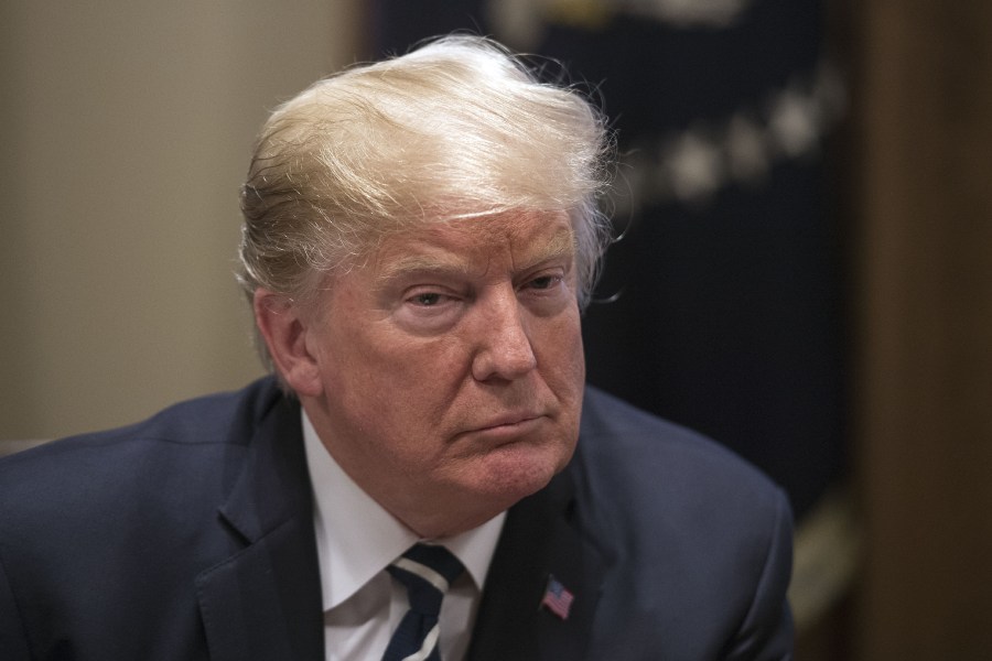 Donald Trump speaks about his meeting with Russian President Vladimir Putin ahead of a meeting with Republican lawmakers and cabinet members on tax cuts at the White House in Washington, D.C., on July 17, 2018. (Credit: Nicholas Kamm/AFP/Getty Images)