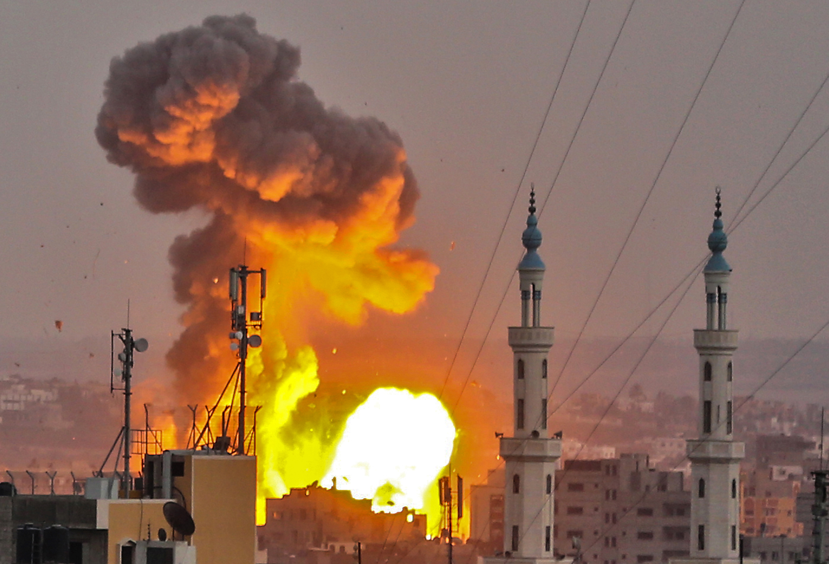 A photo taken on July 20, 2018 shows a fireball exploding in Gaza City during Israeli bombardment. (Credit: Bashar Taleb/AFP/Getty Images)