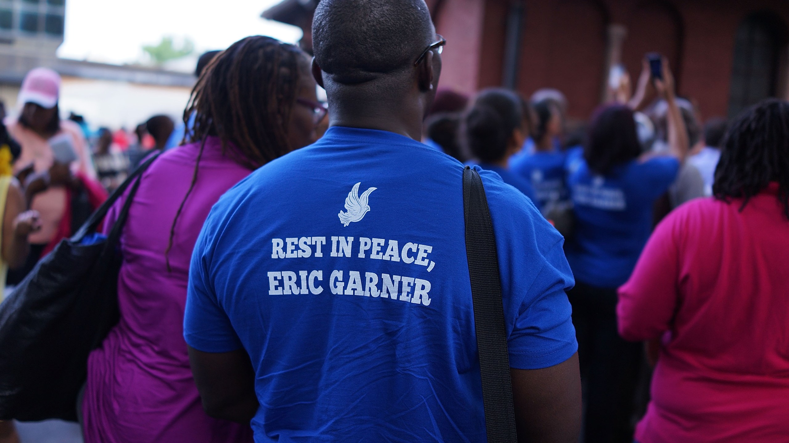 People attend a vigil for Eric Garner near where he died after he was taken into police custody in Staten Island last Thursday on July 22, 2014, in New York City. (Credit: Spencer Platt/Getty Images)