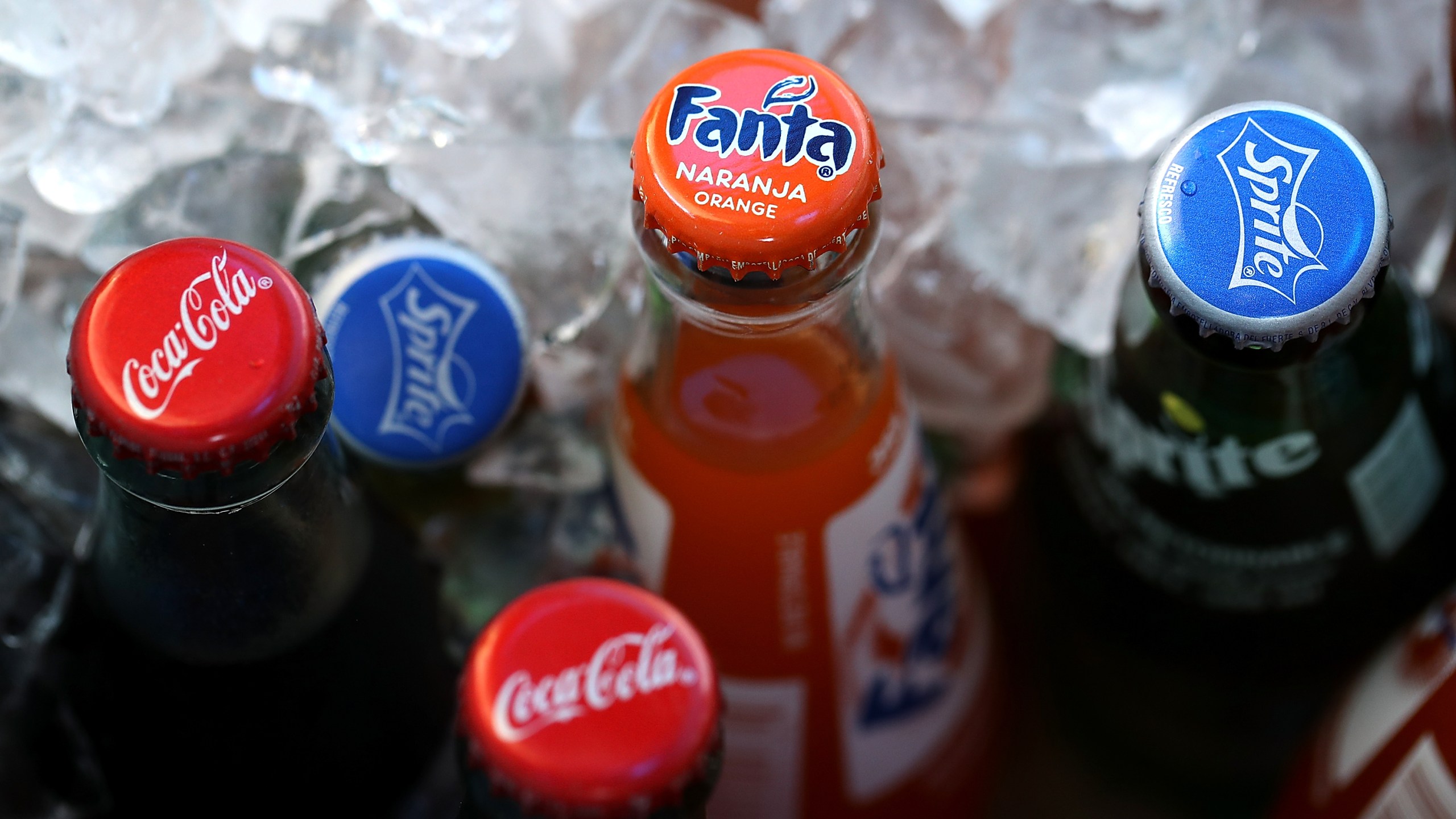 Bottles of soda are displayed in a cooler in San Francisco on June 29, 2018. (Credit: Justin Sullivan / Getty Images)