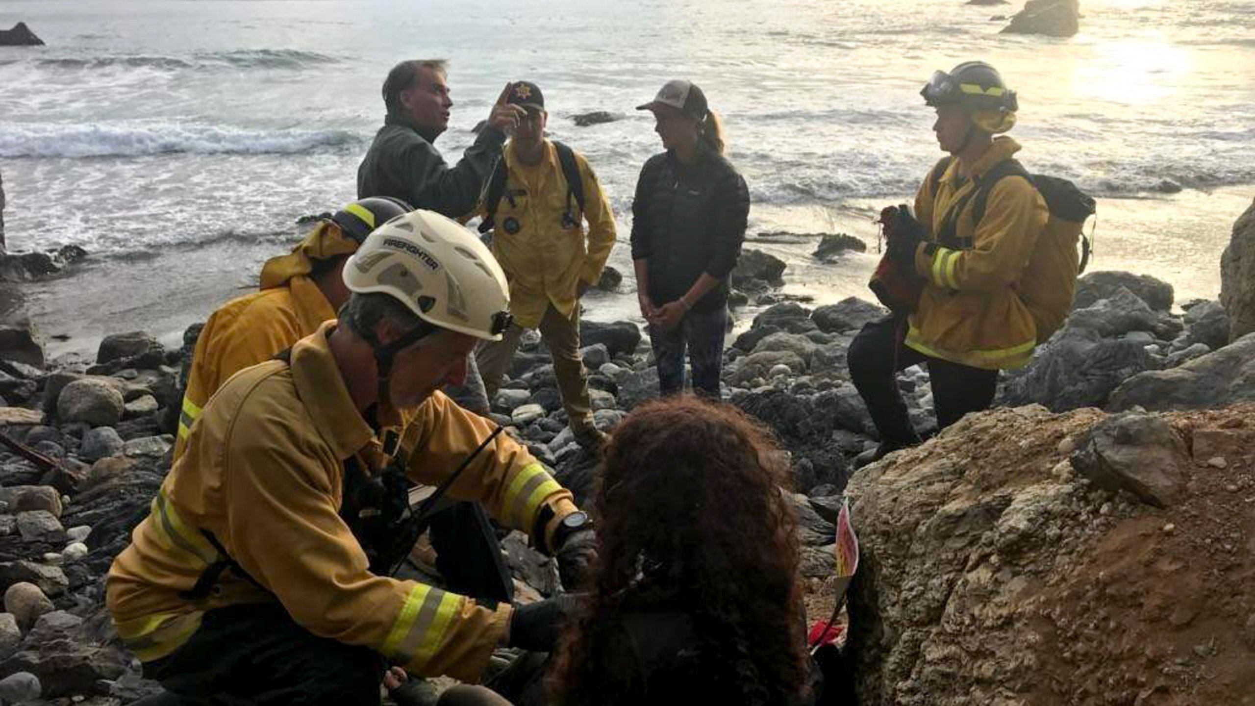 Angela Hernandez receives medical care after being found at the bottom of a cliff in Big Sur on July 13, 2018. (Credit: Monterey County Sheriff's Office)