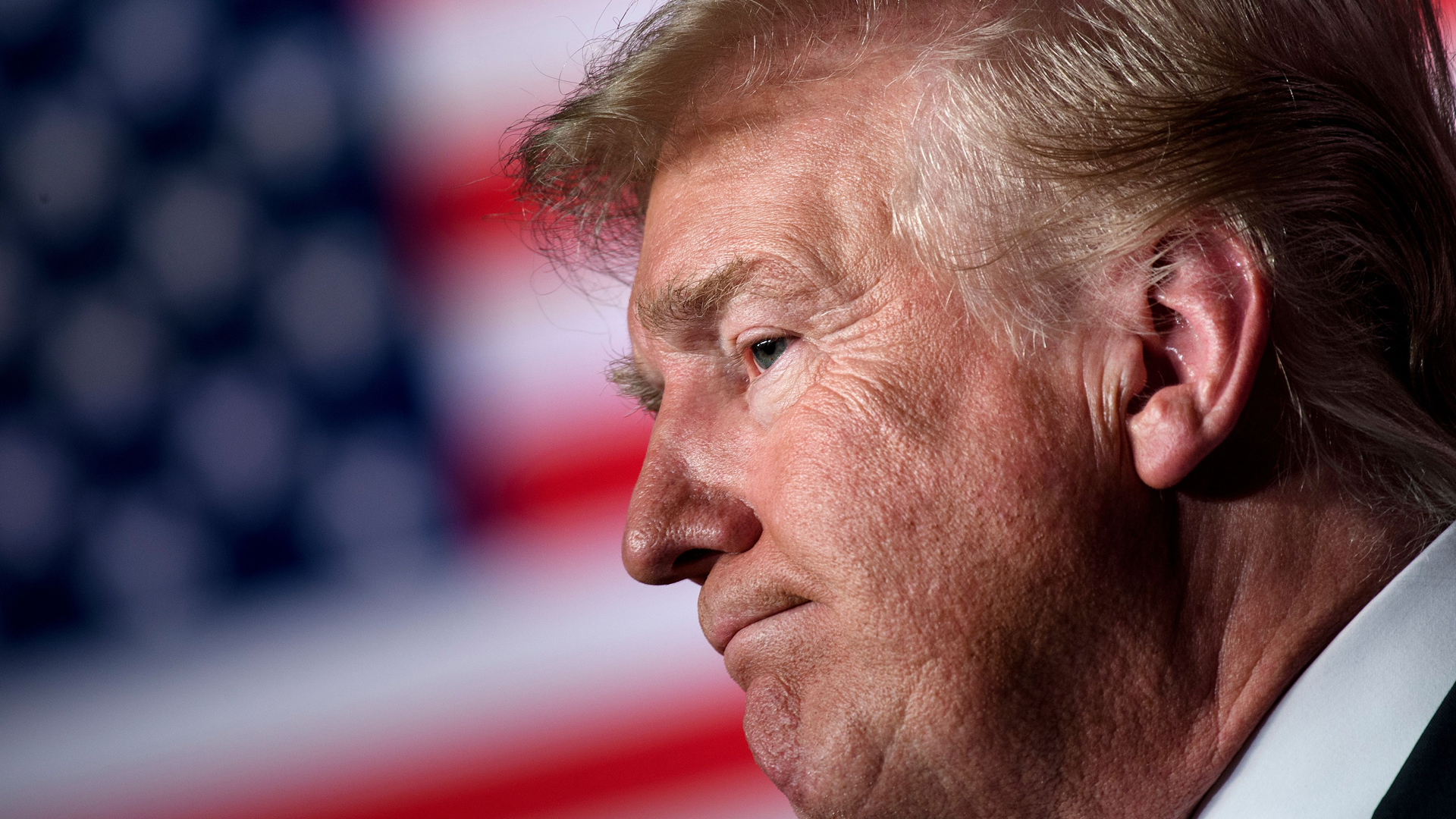 US President Donald Trump pauses while speaking during the Salute to Service dinner at the Greenbrier resort on July 3, 2018 in White Sulphur Springs, West Virginia. (Credit: BRENDAN SMIALOWSKI/AFP/Getty Images)