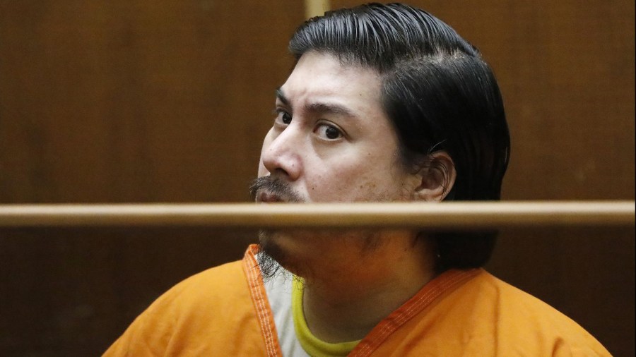 Robert Cain appears in Los Angeles Superior Court, where he was sentenced to two years in prison after pleading no contest to statutory rape charges. (Credit: Al Seib / Los Angeles Times)