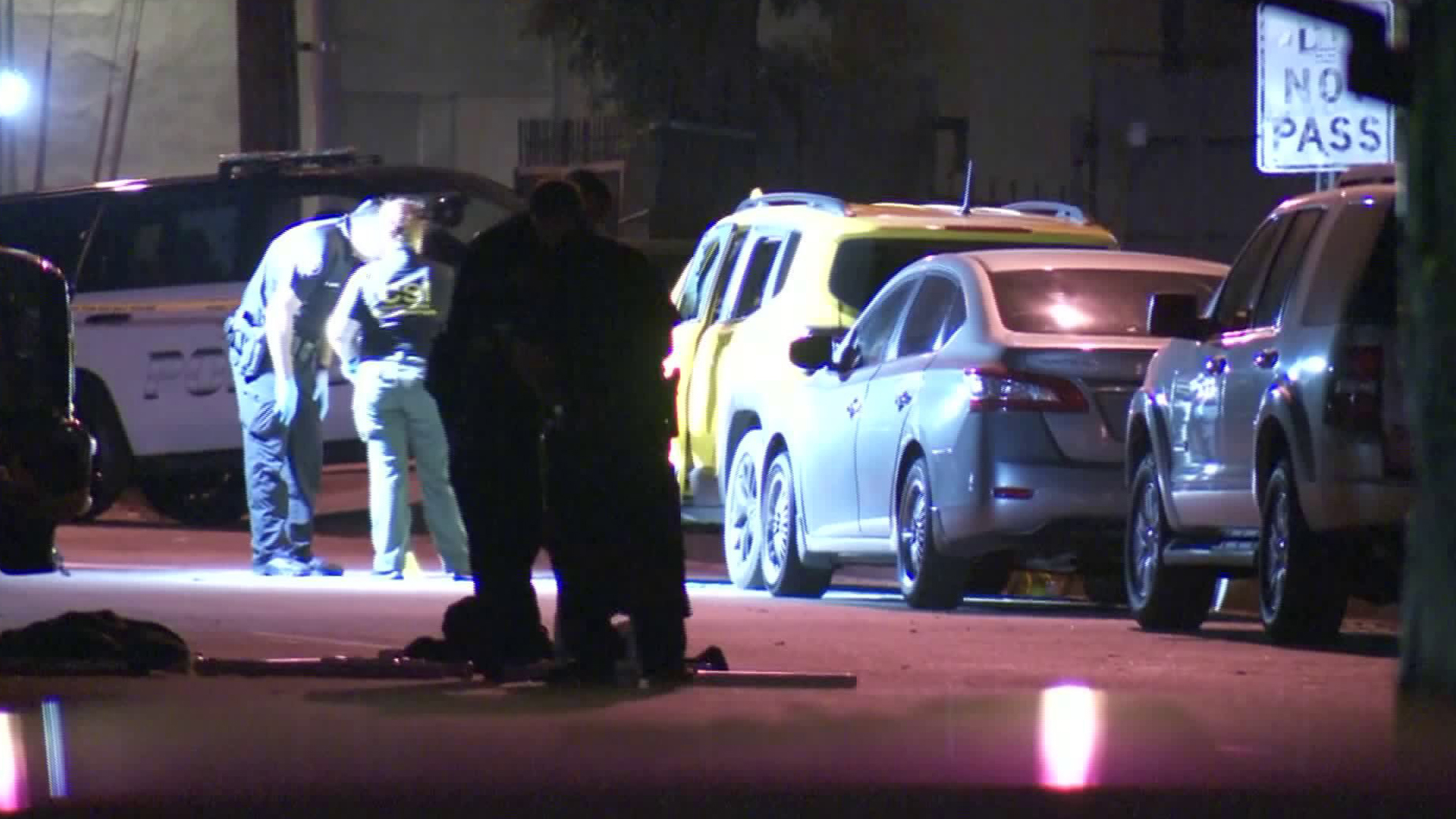 Law enforcement officials investigate a deadly shooting in Colton on Aug. 7, 2018. (Credit: KTLA)