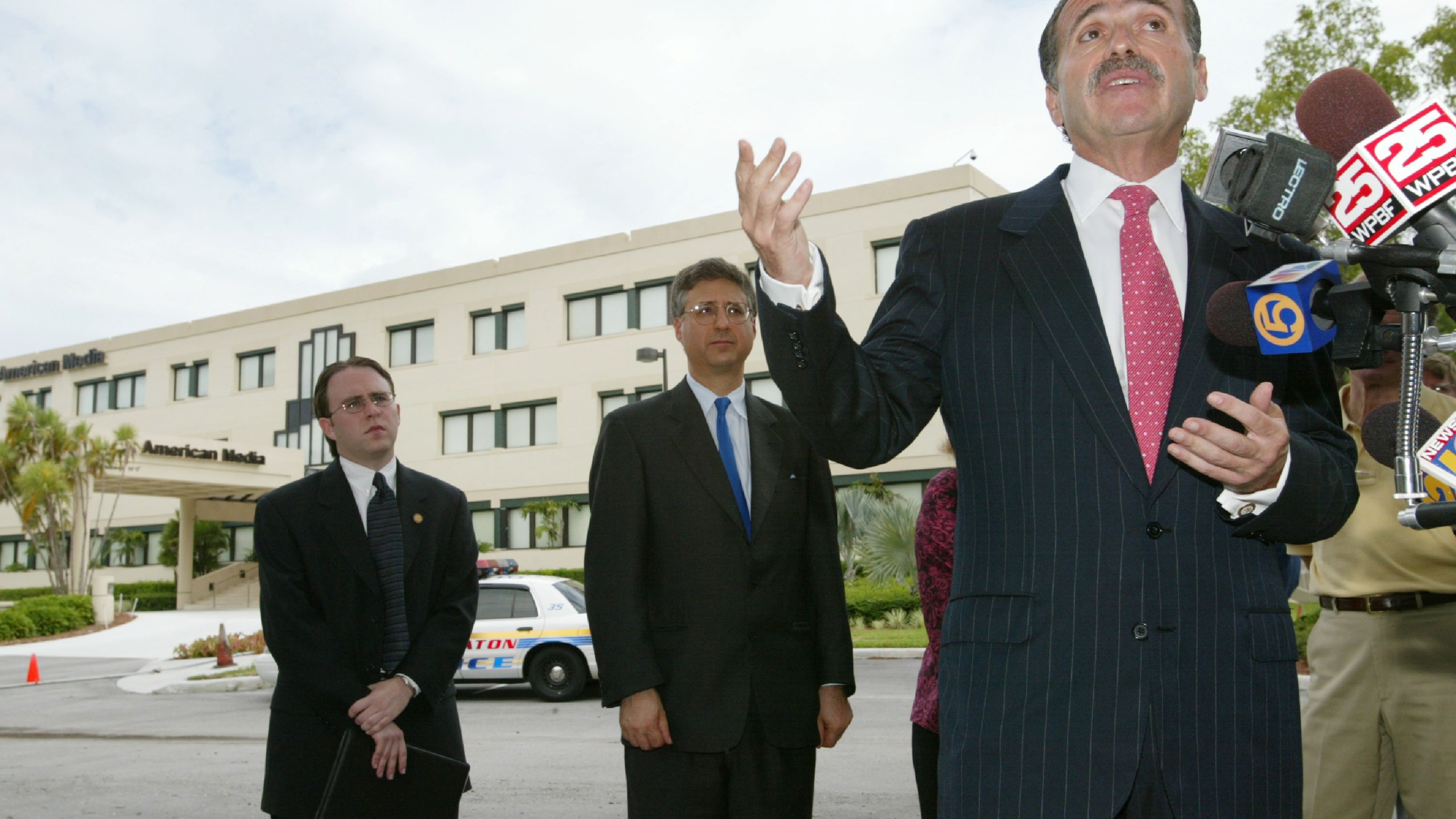 David Pecker, the CEO of American Media, speaks to the news media August 16, 2002, in front of the American Media Building in Boca Raton, Fla. (Credit: Joe Raedle/ Getty Images)