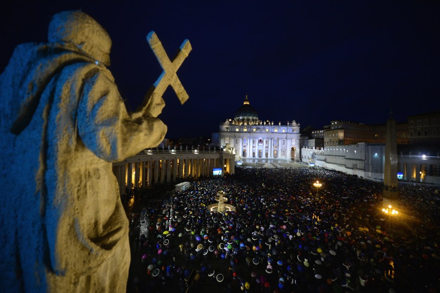 Pilgrims gather in St. Peter's Square on day two of the conclave on March 13, 2013, in Vatican City. (Credit: Jeff J. Mitchell / Getty Images)