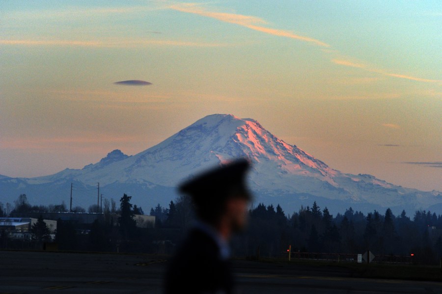 Mount Rainier is seen from Seattle-Tacoma International Airport in Seattle, Washington, on Nov. 24, 2013. (Credit: JEWEL SAMAD/AFP/Getty Images)