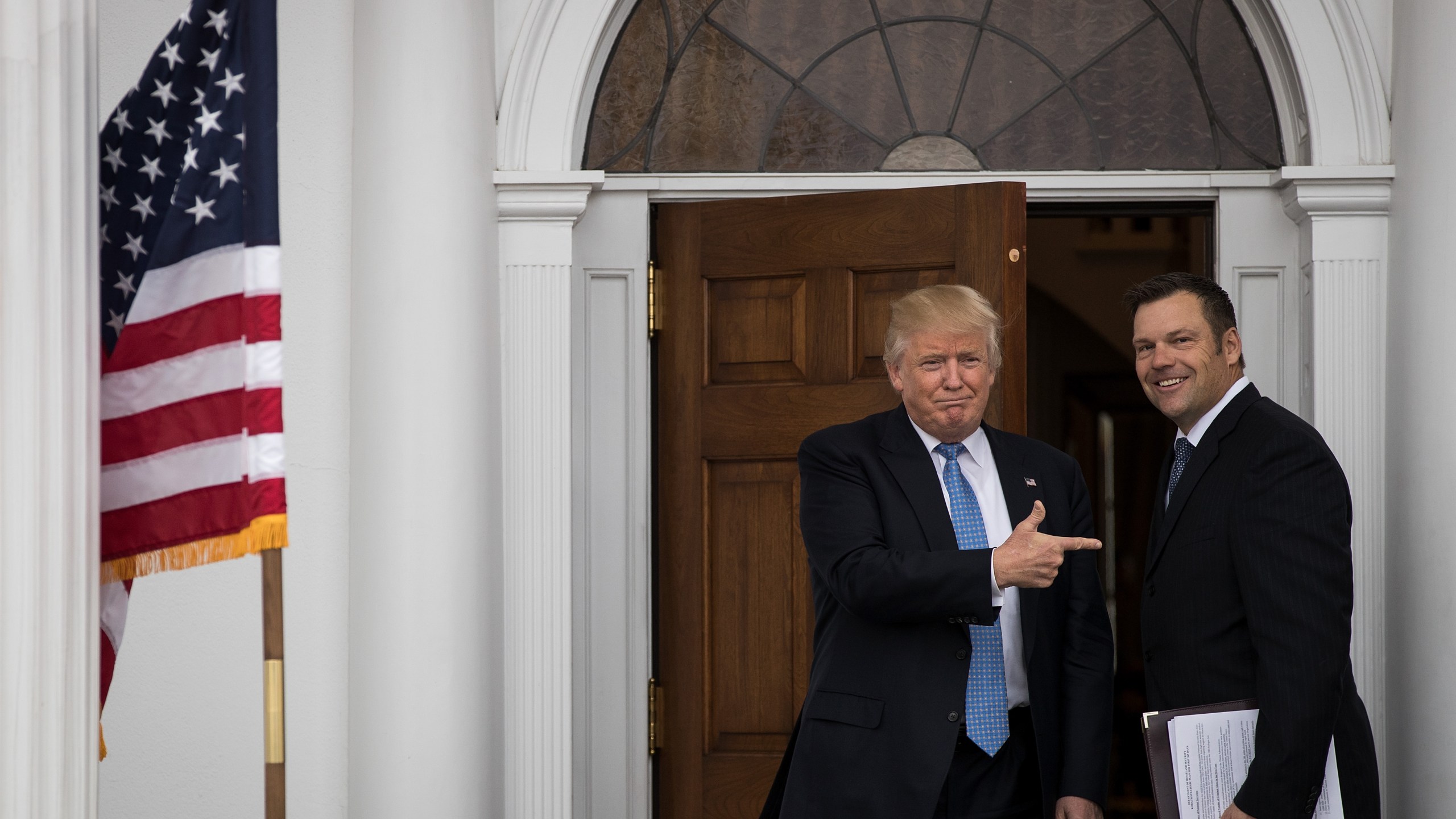 Donald Trump and Kris Kobach appear at Trump International Golf Club on Nov. 20, 2016 in Bedminster Township, New Jersey. (Credit: Drew Angerer/Getty Images)