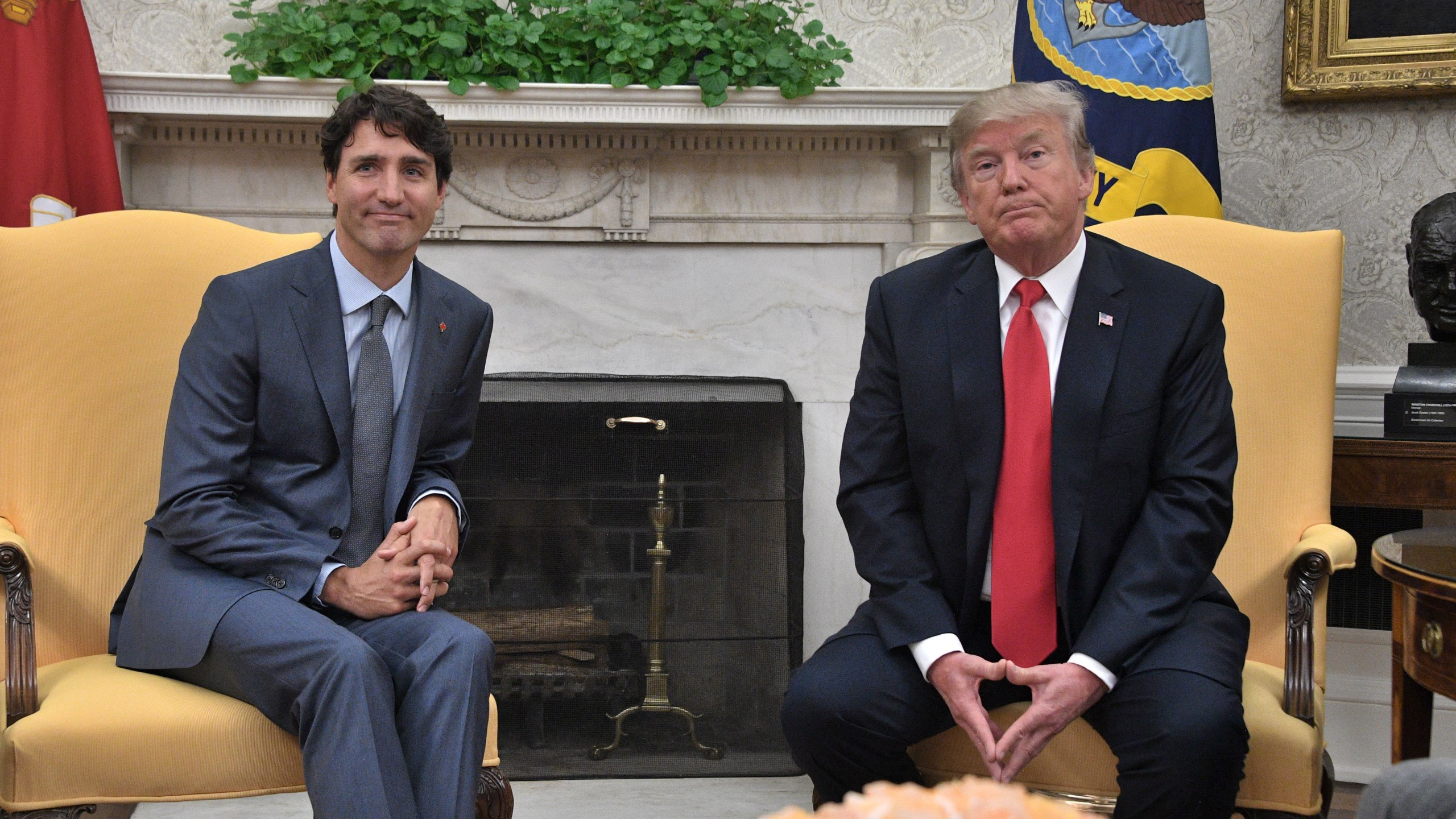 Donald Trump and Justin Trudeau look on during their meeting at the White House in Washington, D.C, on Oct. 11, 2017. (Credit: JIM WATSON/AFP/Getty Images)