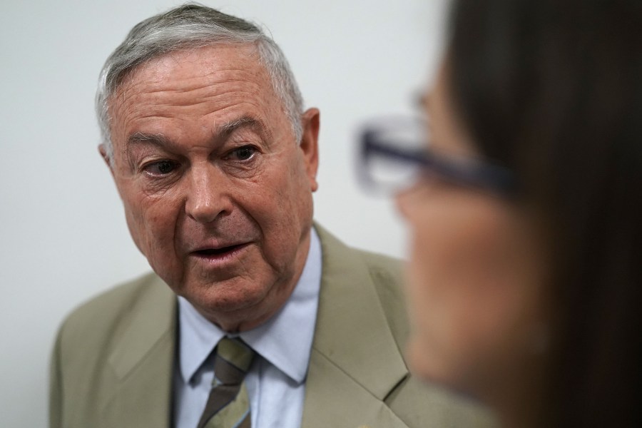 Rep. Dana Rohrabacher speaks to members of the media as he leaves a Republican conference meeting on Capitol Hill on June 7, 2018. (Credit: Alex Wong / Getty Images)