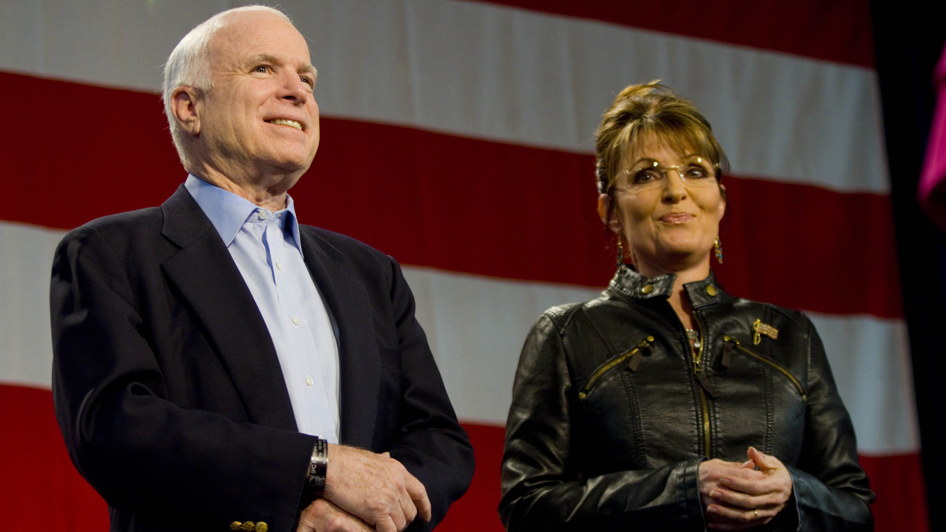 Sen. John McCain and former Alaska Gov. Sarah Palin attend a campaign rally at Pima County Fairgrounds on March 26, 2010 in Tucson, Arizona. (Credit: Darren Hauck/Getty Images)