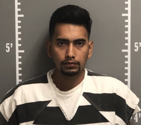 Cristhian Rivera, 24, is seen in a booking photo released Aug. 21, 2018, by the Poweshiek County Sheriff's Office.