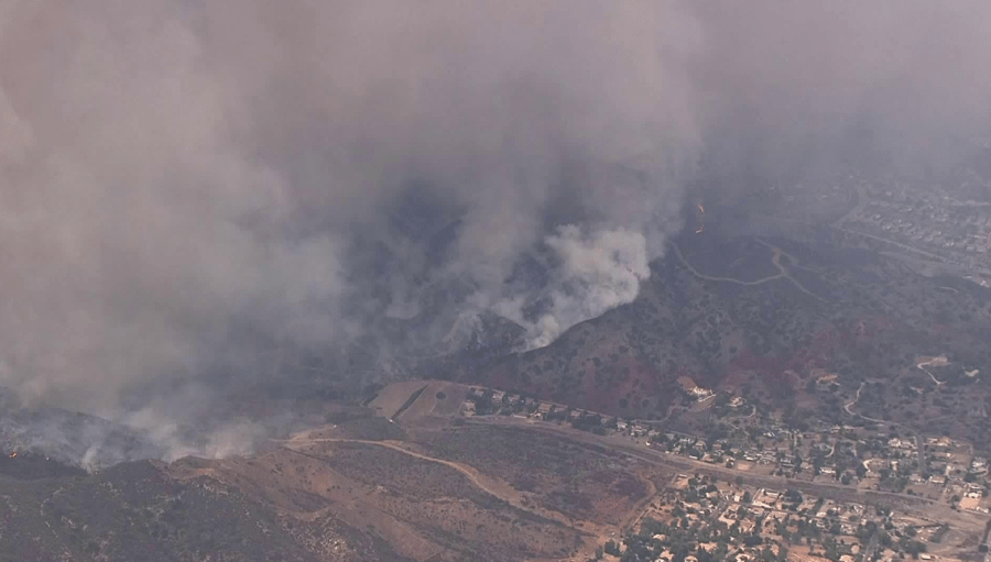 The Holy Fire sends plumes of smoke into the air over the Trabuco Canyon area on Aug. 9, 2018. (Credit: KTLA)