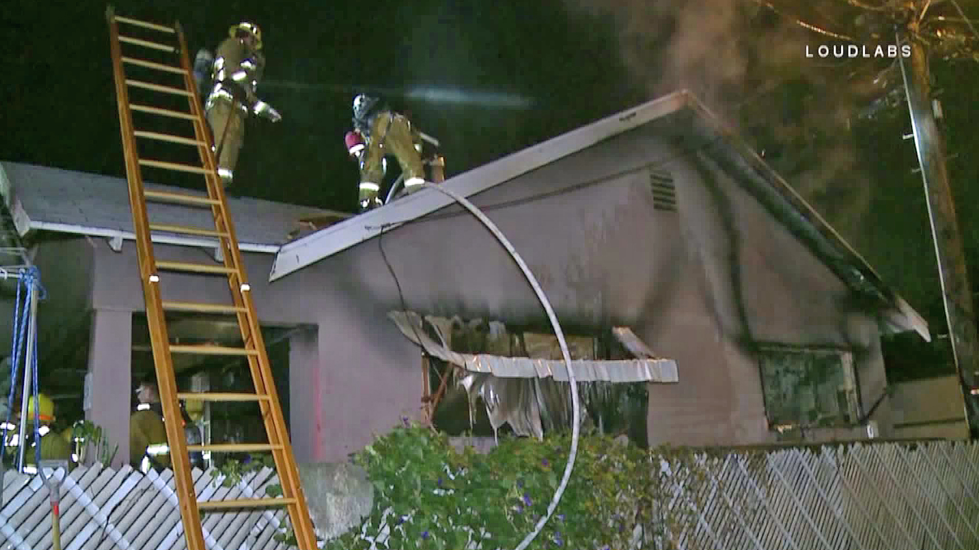 Crews battle a house fire in Cypress Park on Sept. 8, 2018. (Credit: Loudlabs)