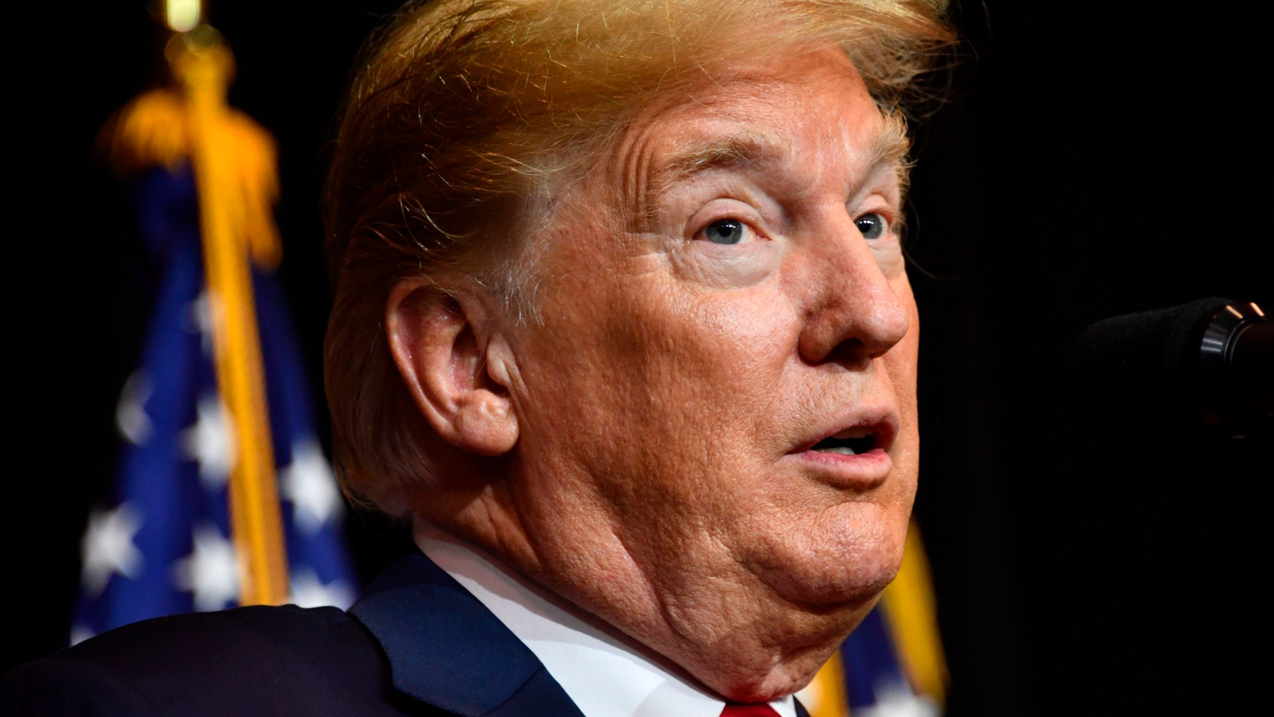 Donald Trump speaks during a fundraiser in Sioux Falls, South Dakota on Sept. 7, 2018. (NICHOLAS KAMM/AFP/Getty Images)