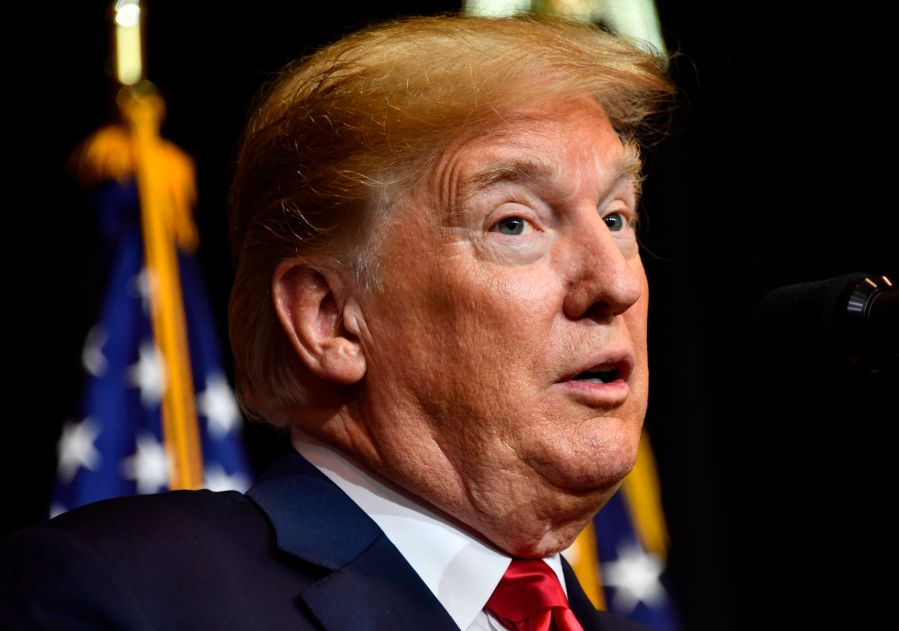 Donald Trump speaks during a fundraiser in Sioux Falls, South Dakota on Sept. 7, 2018. (NICHOLAS KAMM/AFP/Getty Images)