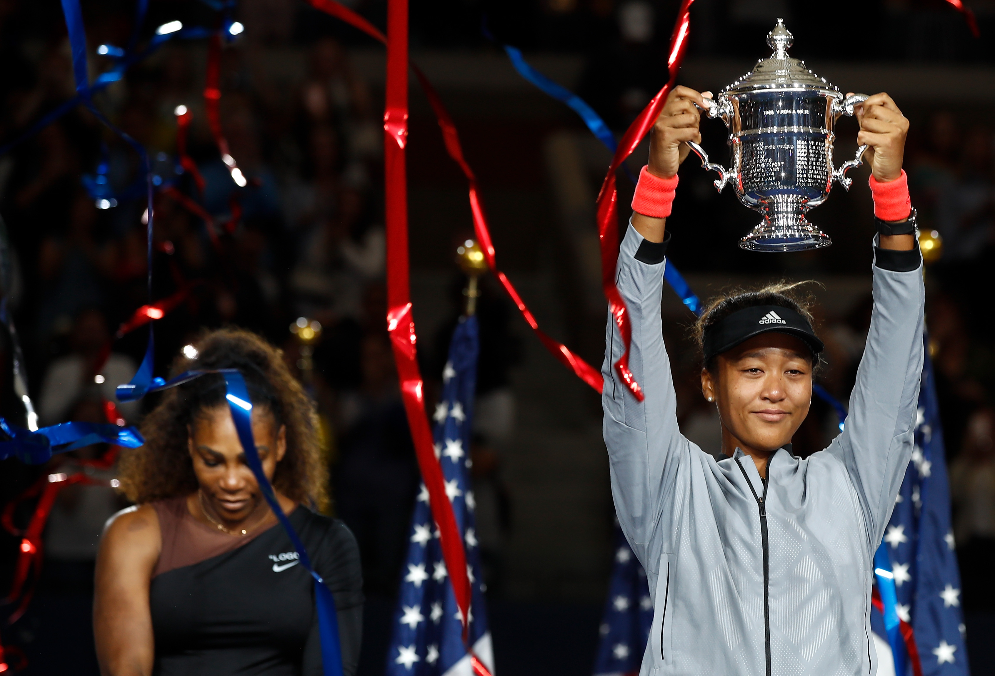 Naomi Osaka of Japan poses with the championship trophy after winning the Women's Singles finals match against Serena Williams at the U.S. Open at the USTA Billie Jean King National Tennis Center on Sept. 8, 2018 in New York. (Credit: Julian Finney/Getty Images)