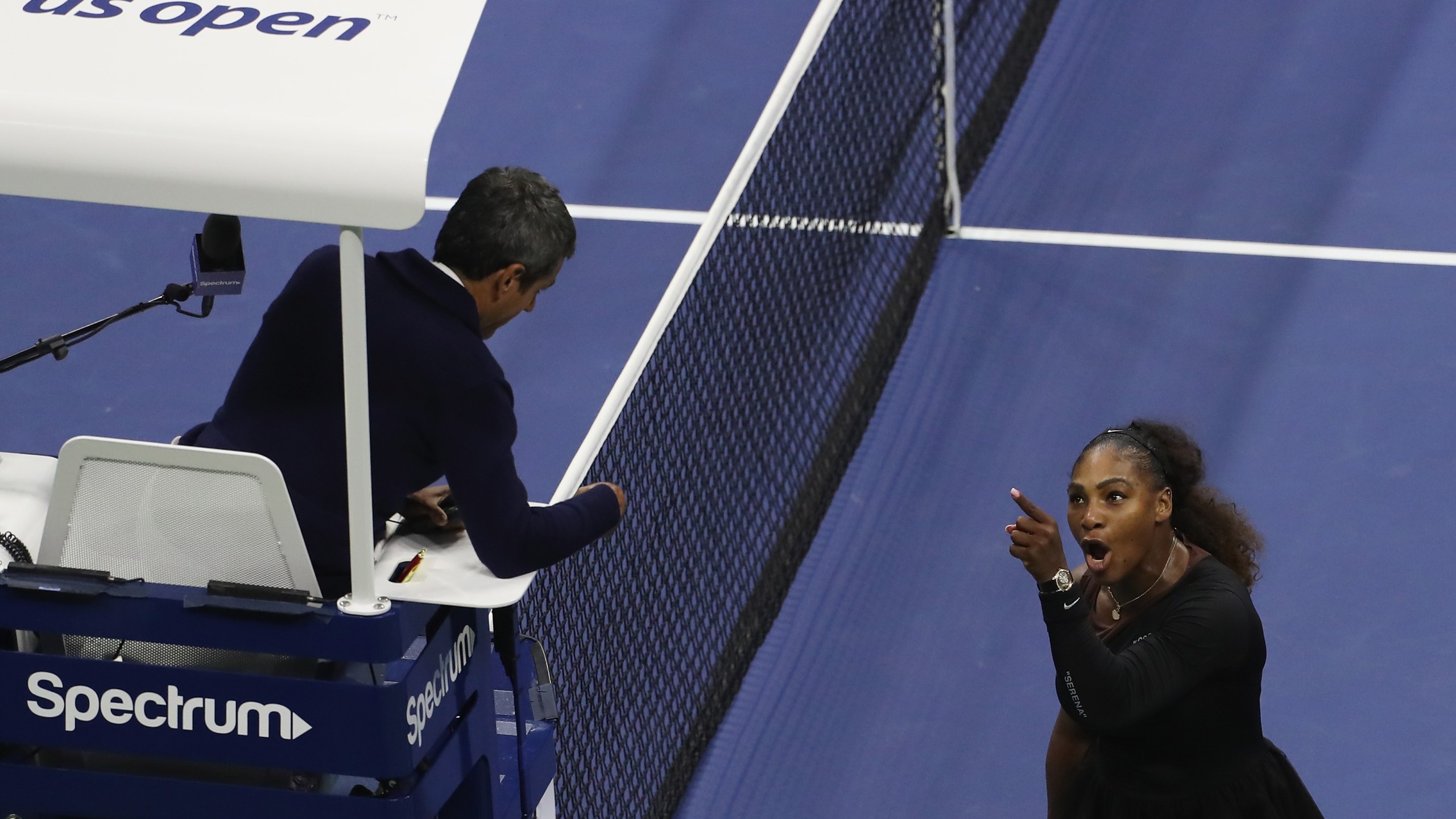 Serena Williams argues with umpire Carlos Ramos during her Women's Singles finals match against Naomi Osaka of Japan on Day Thirteen of the 2018 U.S. Open at the USTA Billie Jean King National Tennis Center on Sept. 8, 2018, in the Flushing neighborhood of the Queens borough of New York City. (Credit: Jaime Lawson/Getty Images for USTA)