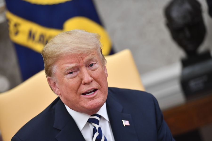 US President Donald Trump speaks to the media with Polish President Andrzej Duda in the Oval office at the White House on September 18, 2018 in Washington,DC. (Credit: NICHOLAS KAMM/AFP/Getty Images)