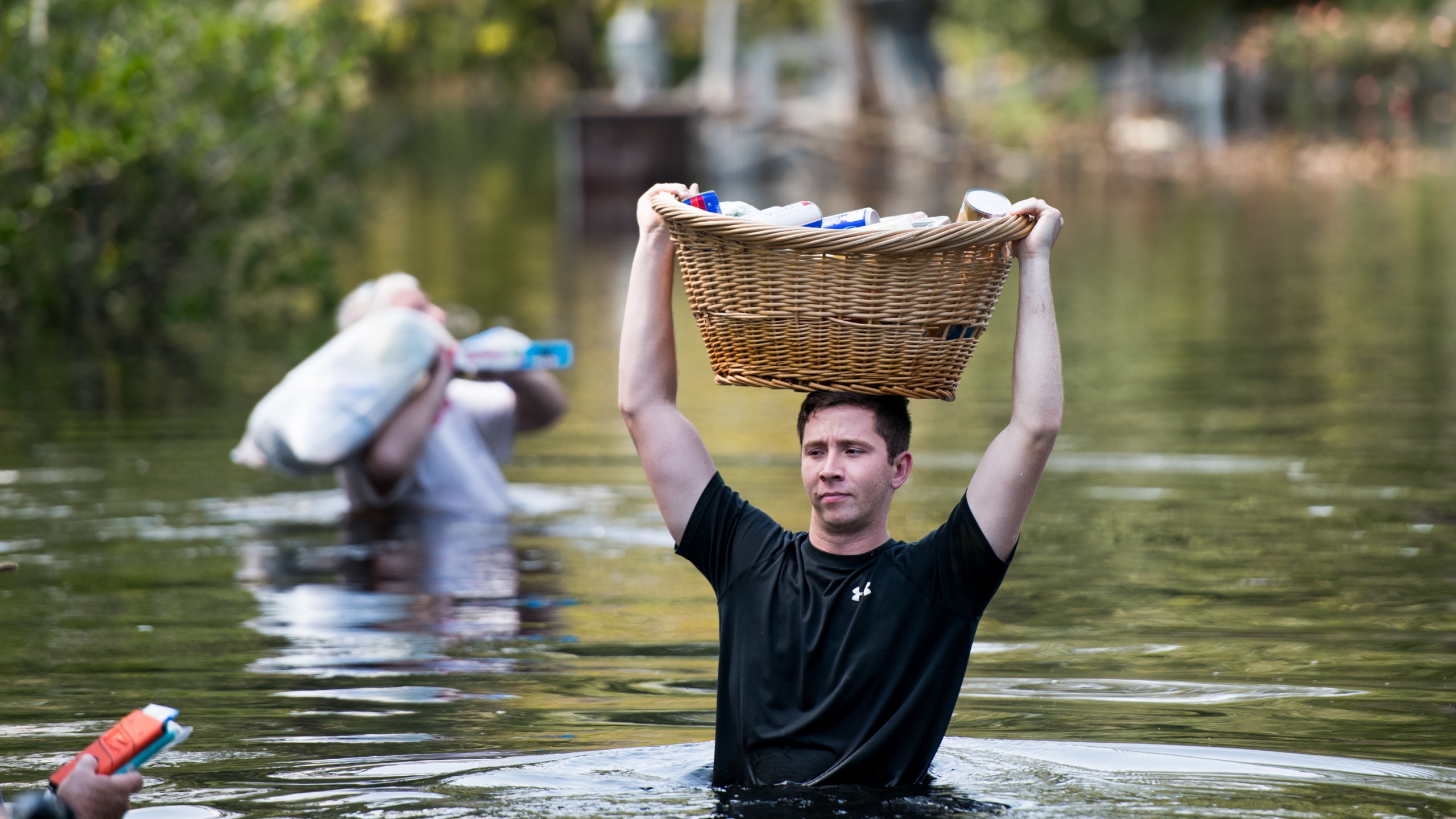 Codey Lamb walks through floodwaters caused by Hurricane Florence on Sept. 20, 2018 in Longs, South Carolina. (Credit: Sean Rayford/Getty Images)