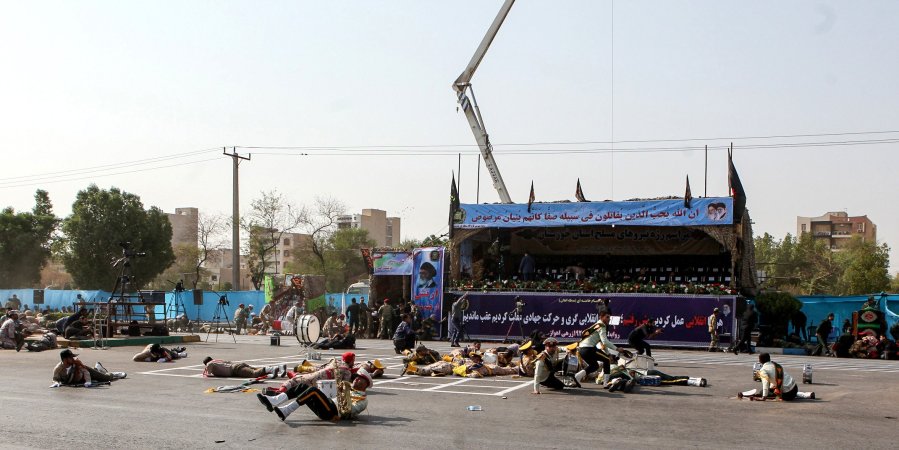 At least 25 people were killed and 60 others injured in an attack on a military parade in Iran's southwestern city of Ahvaz on Saturday, Iran's semi-official Fars News Agency reported, citing Deputy Governor-General of Khouzestan province Hossein Hosseinzadeh. (Credit: Alireza Mohammad/AFP/Getty)