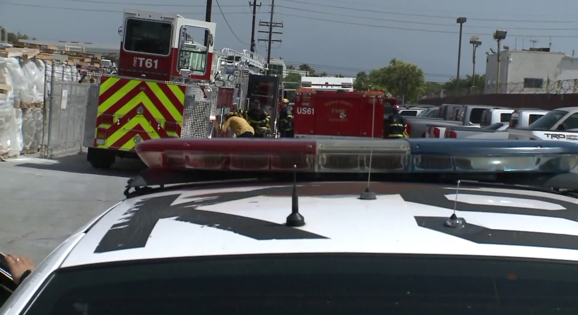 Police and fire officials respond to a fatal machinery accident in Santa Ana on Sept. 20, 2018. (Credit: KTLA)