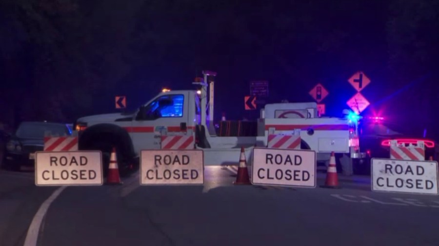 Caltrans officials block Topanga Canyon Boulevard on Sept. 10, 2018. (Credit: KTLA)