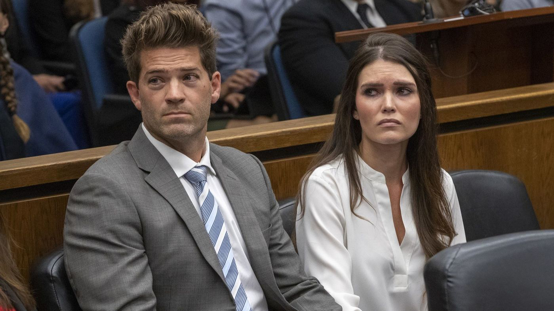 Dr. Grant Robicheaux, sitting with girlfriend Cerissa Riley in court Wednesday, was charged with drugging and raping five more women as prosecutors added felony kidnapping counts and increased bail for each of them to $1 million. (Allen J. Schaben / Los Angeles Times)