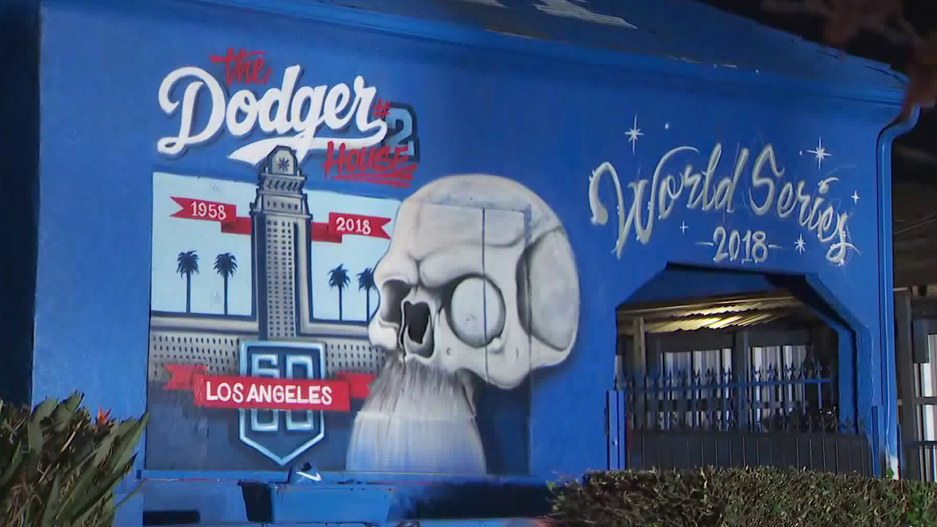 A home in Mid-City painted blue to honor the Dodgers during the 2018 World Series is seen in this image on Oct. 25, 2018. (Credit: KTLA)