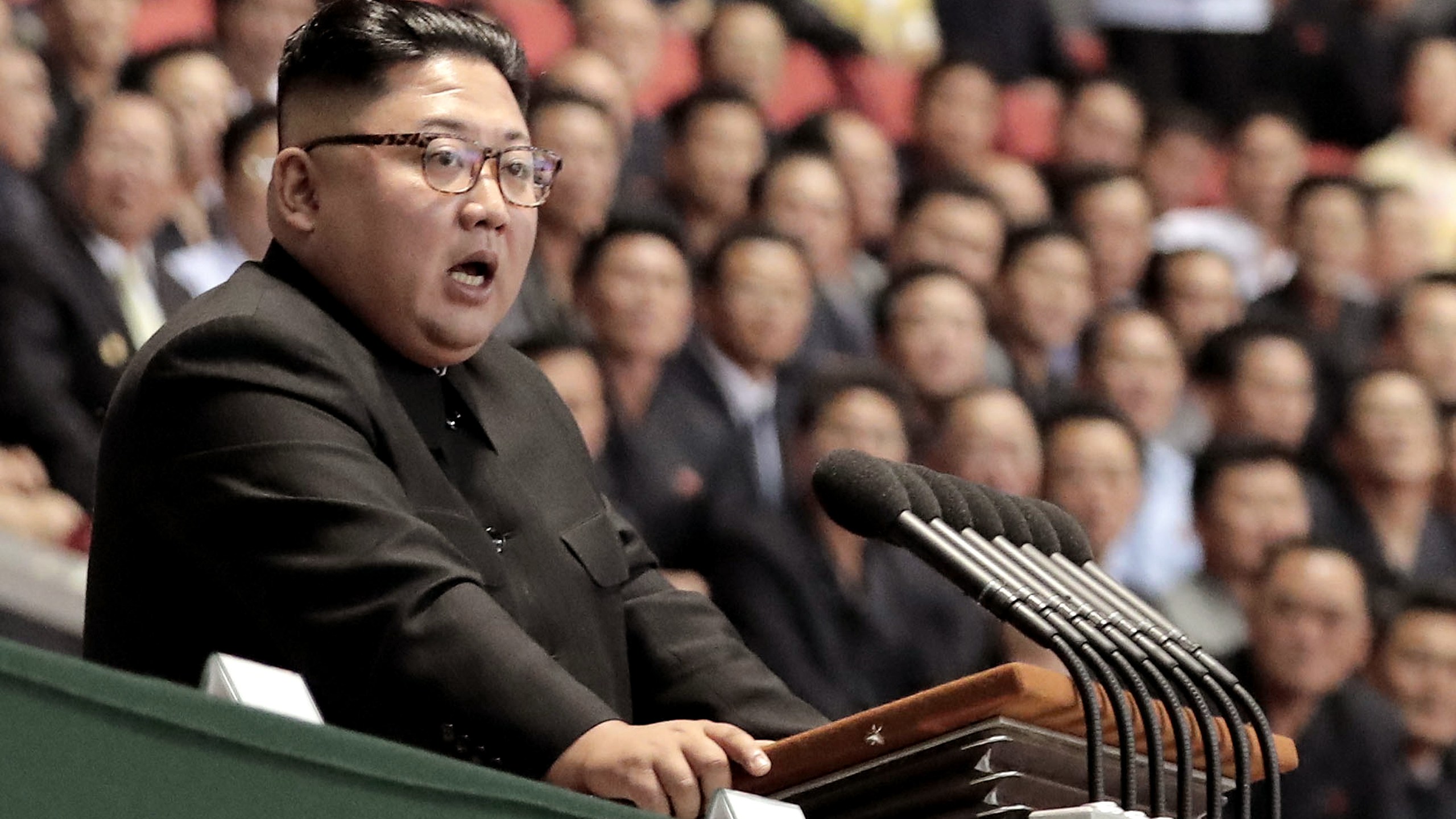 North Korean leader Kim Jong Un speaks after watch the gymnastic and artistic performance at the May Day Stadium on September 19, 2018 in Pyongyang, North Korea. (Credit: Pyeongyang Press Corps/Pool/Getty Images)