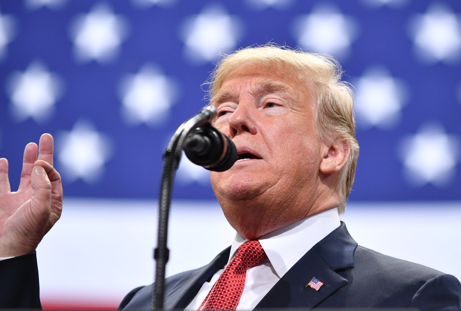 US President Donald Trump speaks during a rally at the Mayo Civic Center in Rochester, Minnesota on October 4, 2018. (Credit: MANDEL NGAN/AFP/Getty Images)