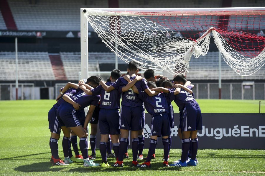 Young footballers of Thai team Wild Boars -who were rescued from the Tham Luang cave in Thailand get ready for a football match against River Plate Youth Team at Monumental stadium, in Buenos Aires on Oct. 7, 2018. (Credit: Eitan Abramovic/POOL /AFP/Getty Images)