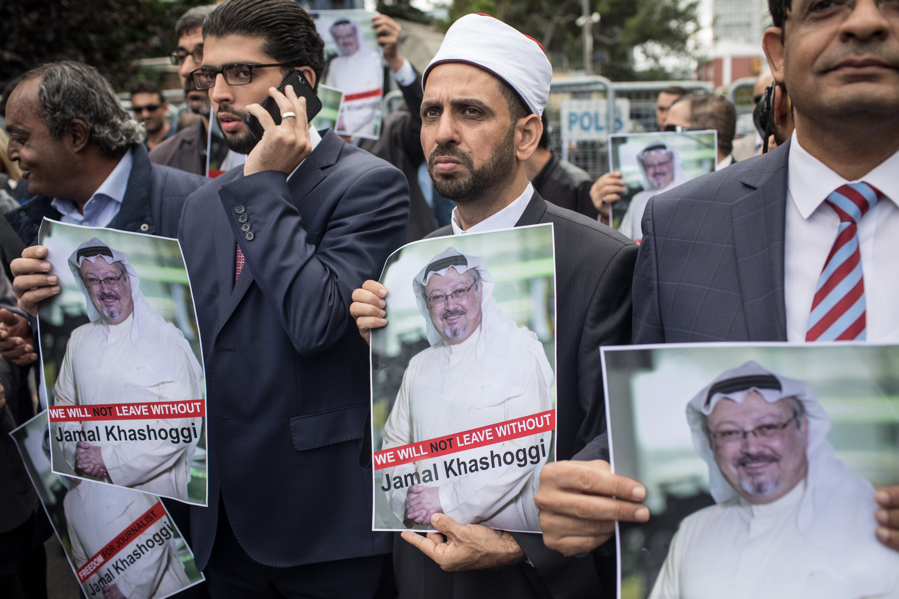 People hold posters of missing Saudi journalist Jamal Khashoggi during a protest organized by members of the Turkish-Arabic Media Association at the entrance to Saudi Arabia's consulate on Oct. 8, 2018 in Istanbul. (Credit: Chris McGrath/Getty Images)