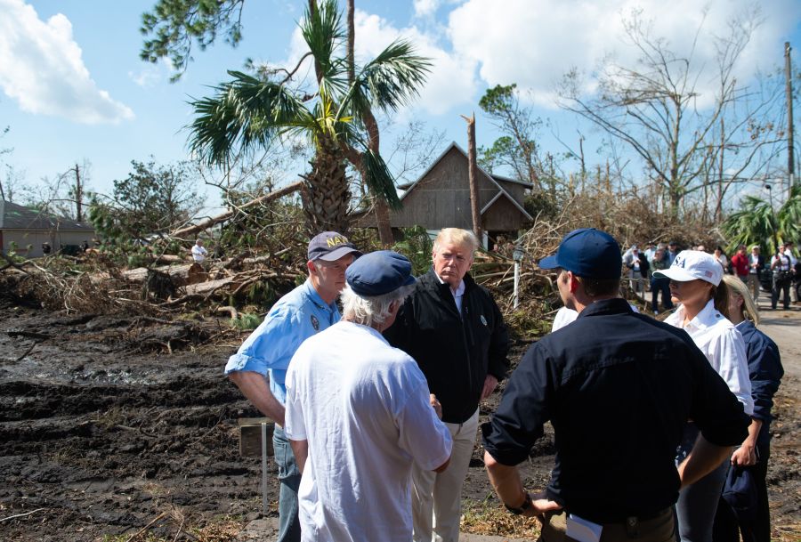 President Donald Trump and first lady Melania Trump tour damage from Hurricane Michael in Lynn Haven, Florida, October 15, 2018. (Credit: SAUL LOEB/AFP/Getty Images)