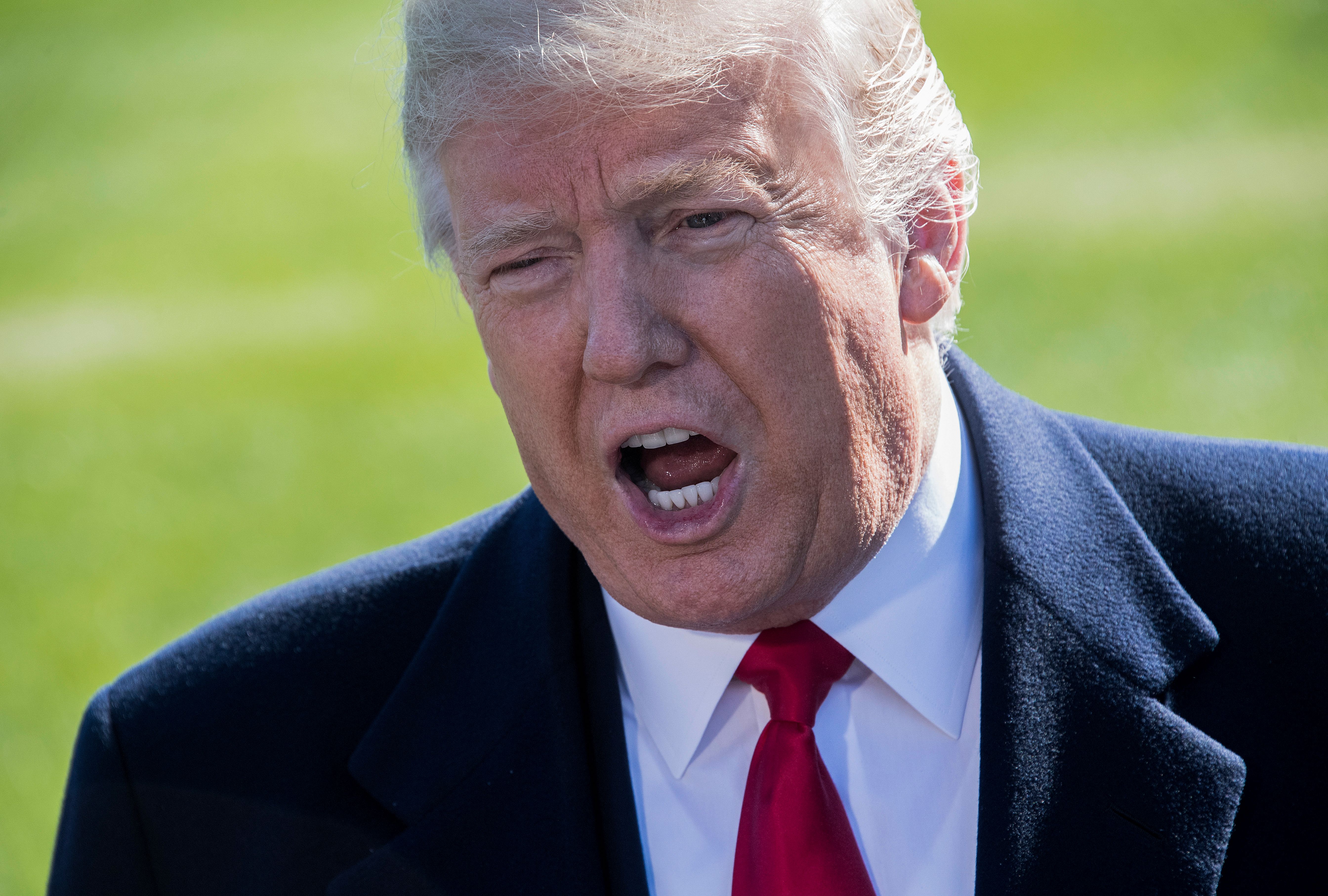 President Donald Trump speaks to the press as he departs the White House on Oct. 22, 2018. (Credit: Jim Watson / AFP / Getty Images)