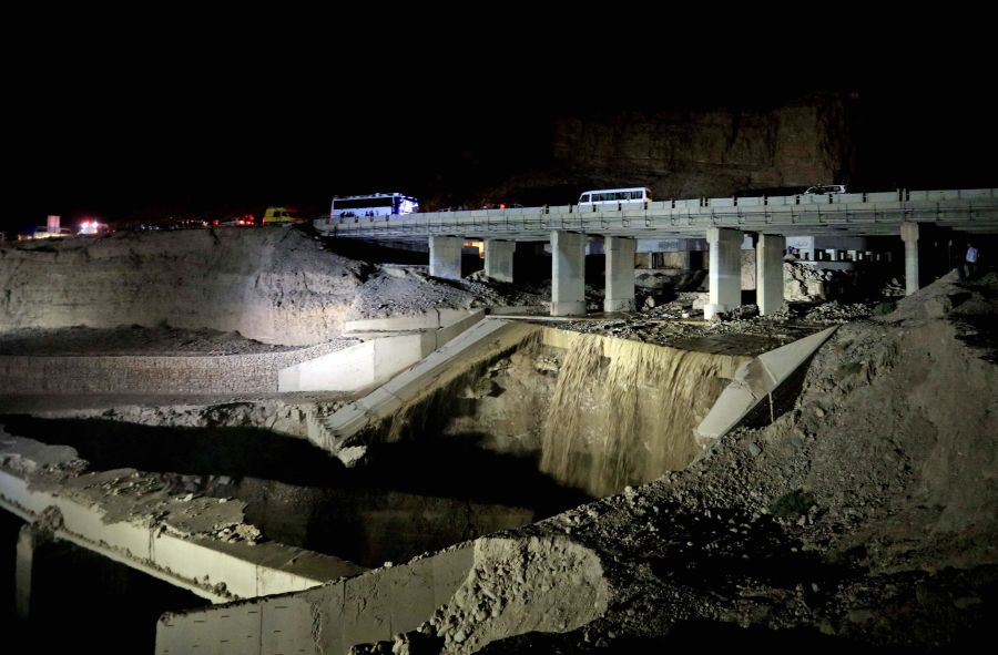 This picture shows the site of a bus accident near the Dead Sea in Jordan on Oct. 25, 2018. Flash floods in Jordan swept away a school bus on October 25, killing at least 17 people, mostly pupils. (Credit: KHALIL MAZRAAWI/AFP/Getty Images)