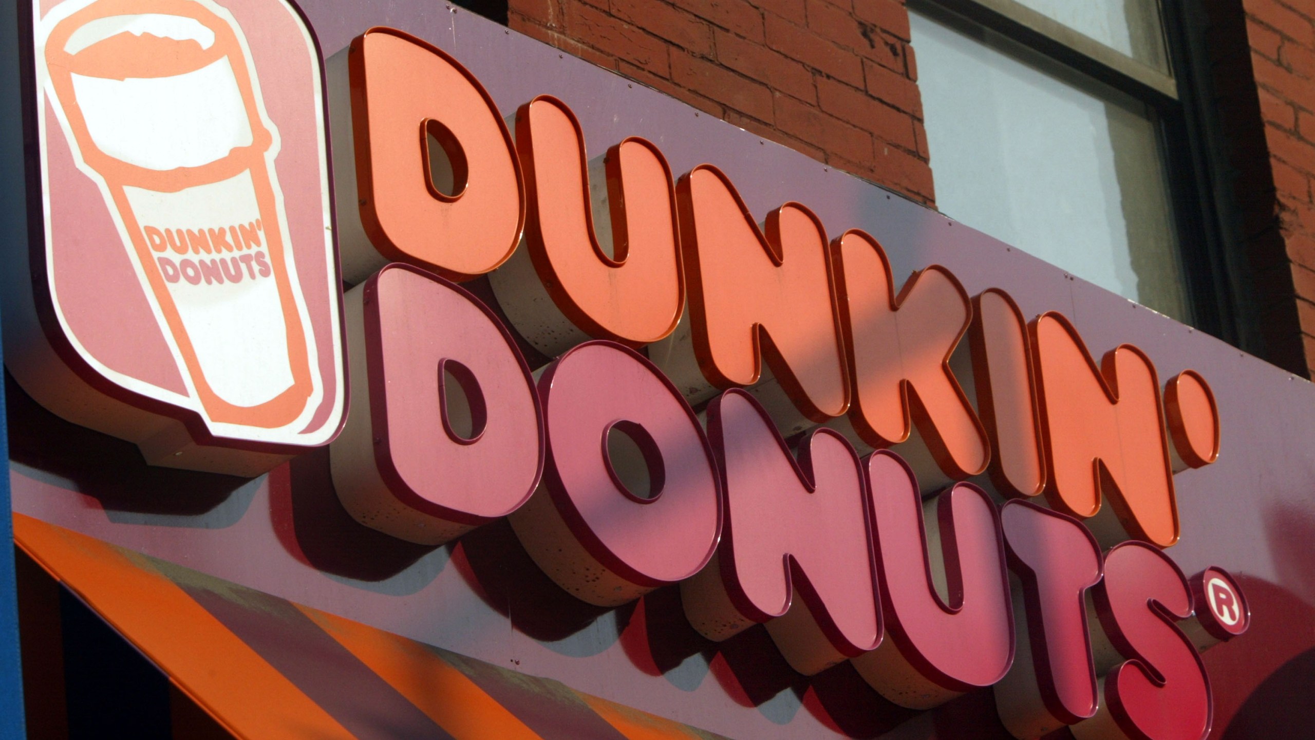 A Dunkin' Donuts sign is seen in a file photo. (Credit: Mario Tama/Getty Image)